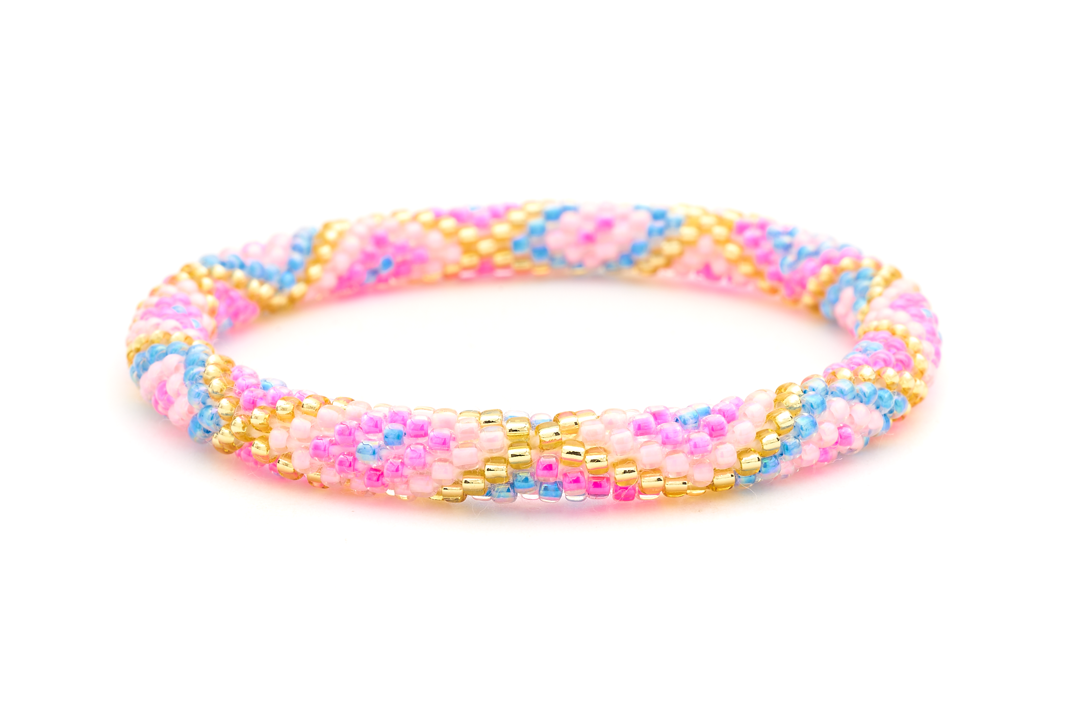 Sashka Co handmade beaded friendship bracelet with pink, light pink, blue, and champagne gold glass beads. Crafted in Nepal by skilled artisans in a criss cross pattern.