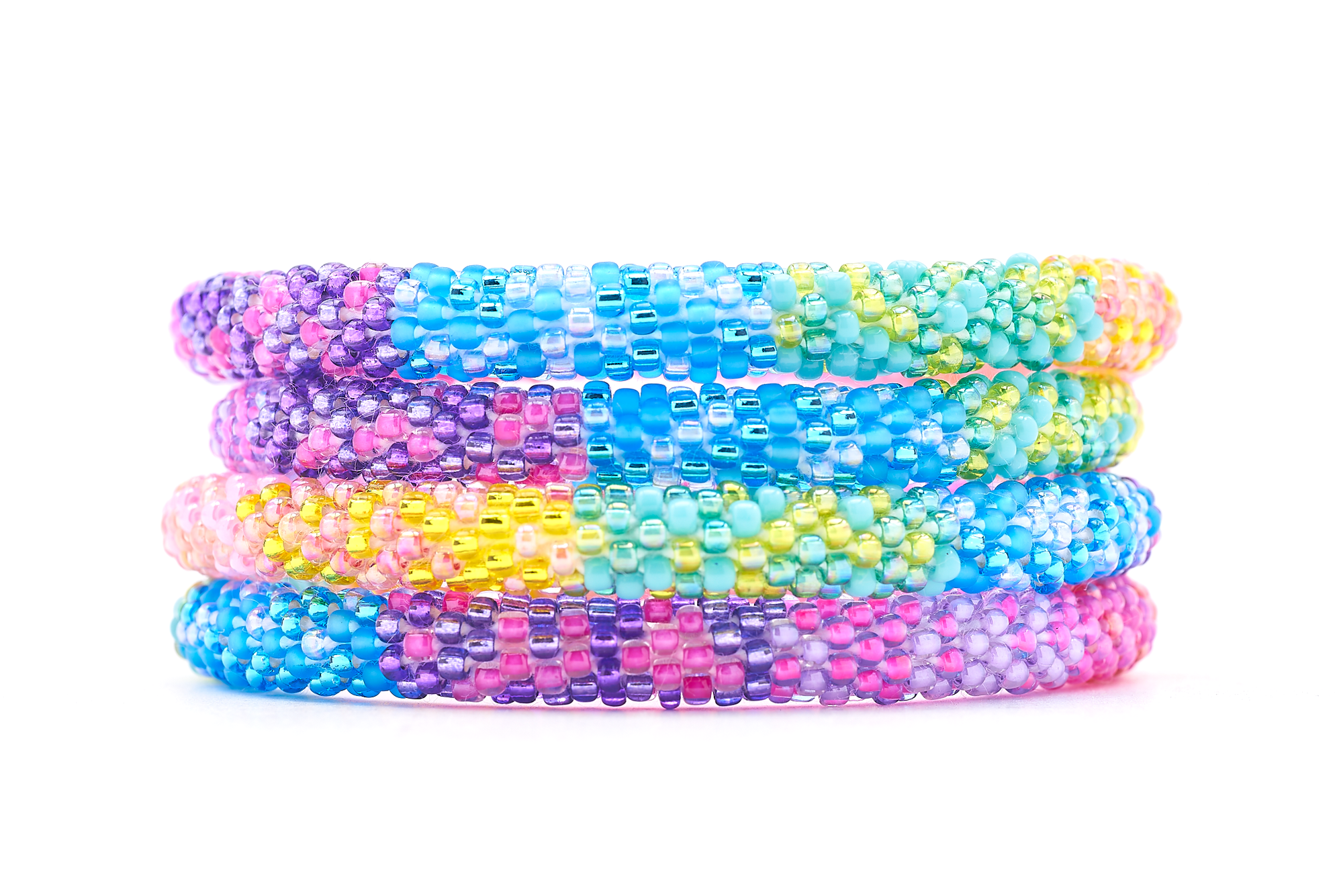 Sashka Co handmade beaded friendship bracelet with pink, purple, matte blue, blue, green, turquoise, yellow, and coral glass beads. Crafted in Nepal by skilled artisans in a confetti block pattern.