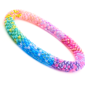 Sashka Co handmade beaded friendship bracelet with pink, purple, matte blue, blue, green, turquoise, yellow, and coral glass beads. Crafted in Nepal by skilled artisans in a confetti block pattern.
