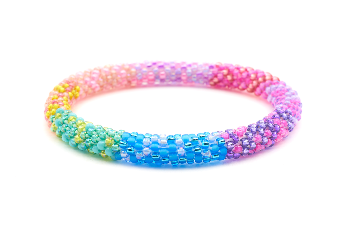 Sashka Co handmade beaded friendship bracelet with pink, purple, matte blue, blue, green, turquoise, yellow, and coral glass beads. Crafted in Nepal by skilled artisans in a confetti block pattern.