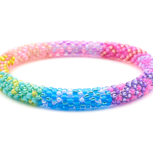 Sashka Co handmade beaded friendship bracelet with pink, purple, matte blue, blue, green, turquoise, yellow, and coral glass beads. Crafted in Nepal by skilled artisans in a confetti block pattern.