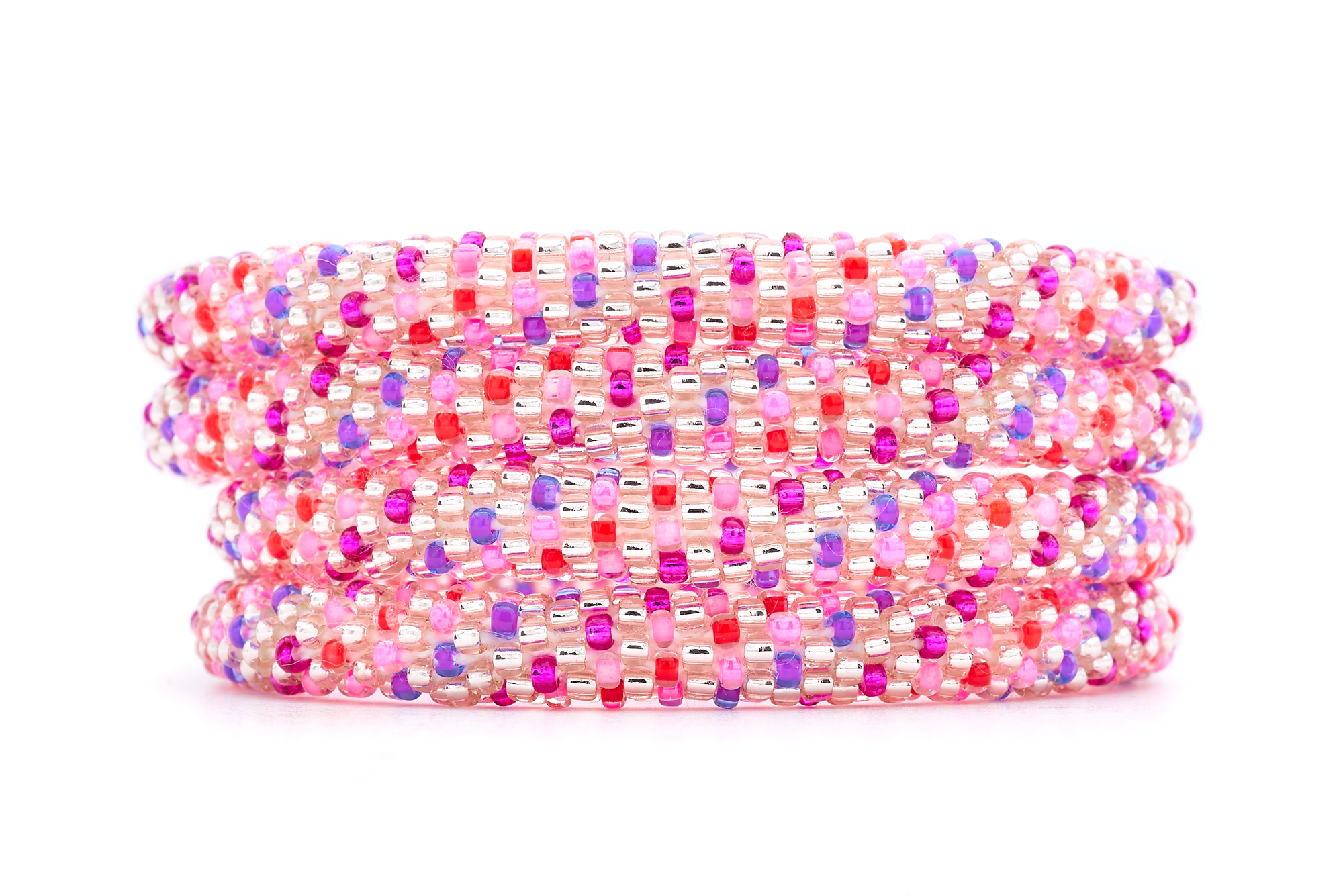 Sashka Co handmade beaded friendship bracelet with pink, purple, red, and rose gold polka dot spiral pattern. Crafted in Nepal by skilled artisans.