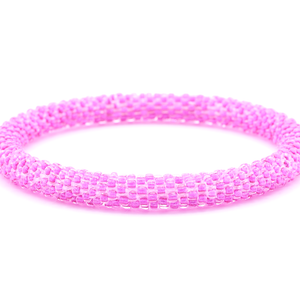 Sashka Co handmade beaded friendship bracelet with solid pink glass beads. Crafted in Nepal by skilled artisans.