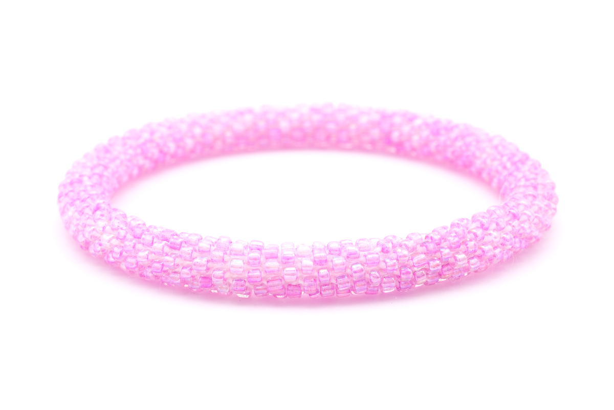 Sashka Co handmade beaded friendship bracelet with pink glass beads. Crafted in Nepal by skilled artisans in a solid pattern.