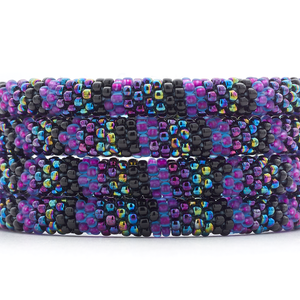Sashka Co handmade beaded friendship bracelet with purple, black, and iridescent line pattern. Crafted in Nepal by skilled artisans.