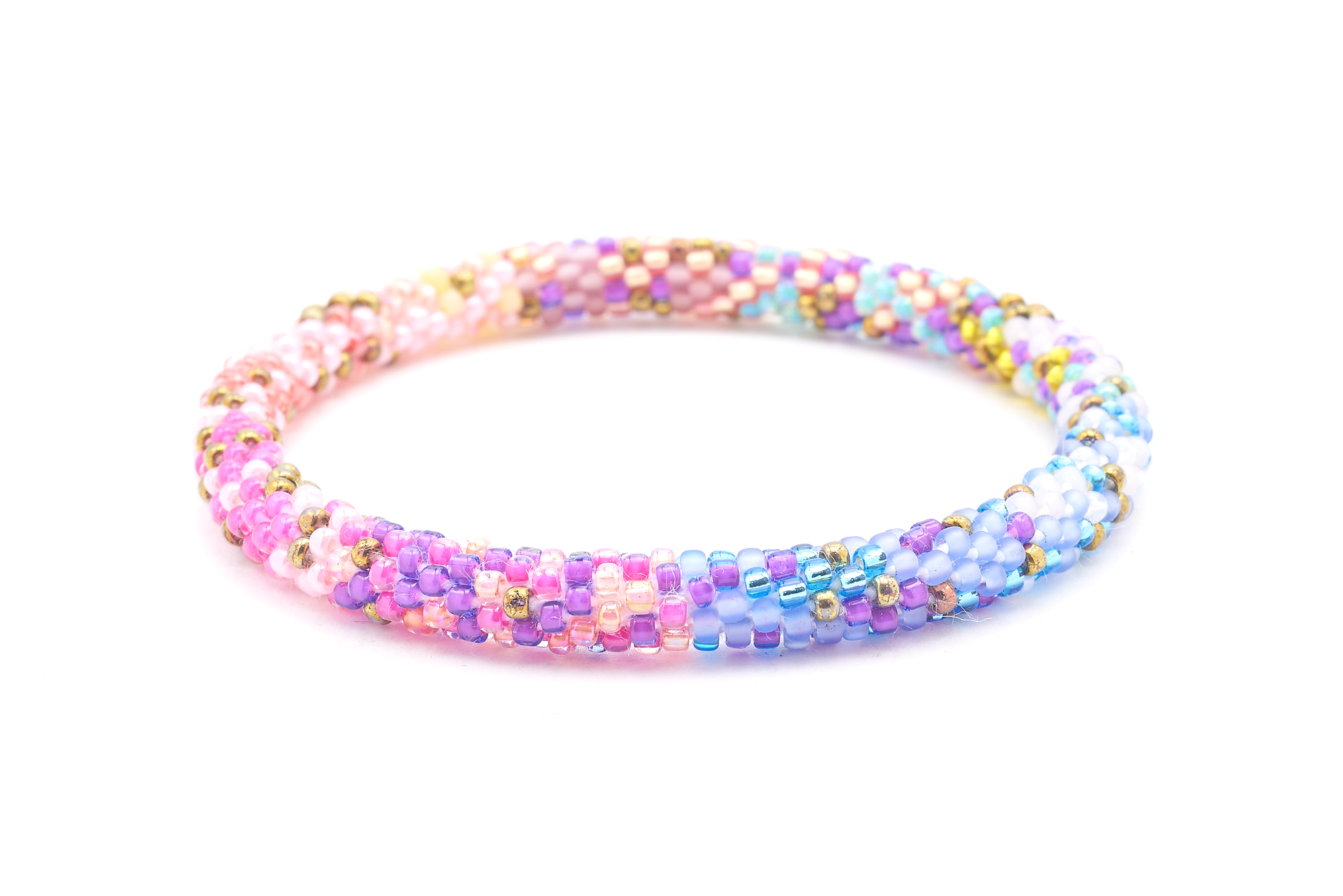 Sashka Co handmade beaded friendship bracelet with purple, pink, red, rose red, aqua, white, blue, bronze, matte periwinkle, matte mauve, matte white, and matte yellow glass beads. Crafted in Nepal by skilled artisans in a confetti mixed pattern.


