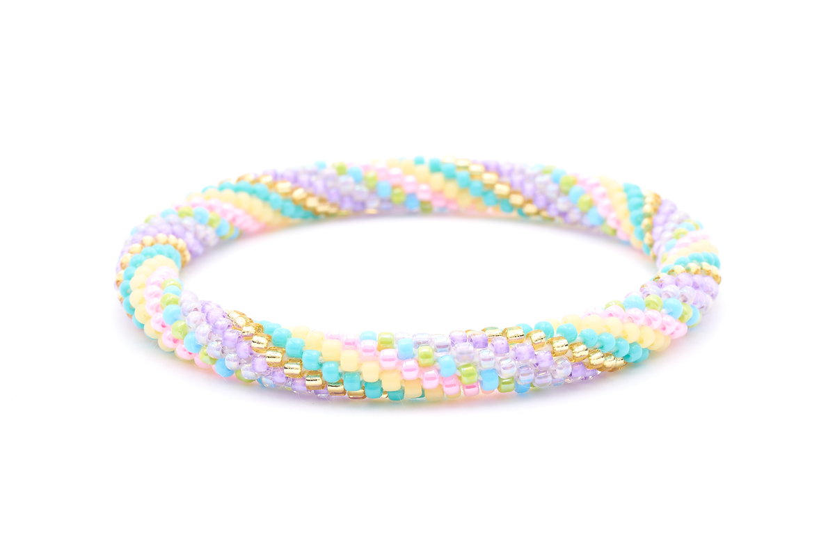 Sashka Co. handmade beaded friendship bracelet with purple, pink, turquoise, green, champagne gold, and matte yellow spiral pattern. Crafted in Nepal by skilled artisans.
