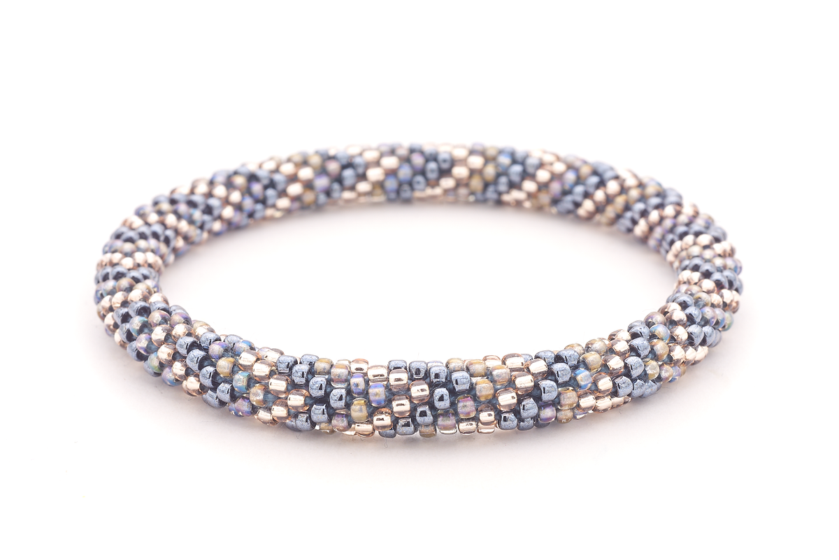 Sashka Co handmade beaded friendship bracelet with silver, clear, and iridescent glass beads in a chevron pattern. Artisan crafted in Nepal.

