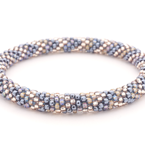 Sashka Co handmade beaded friendship bracelet with silver, clear, and iridescent glass beads in a chevron pattern. Artisan crafted in Nepal.

