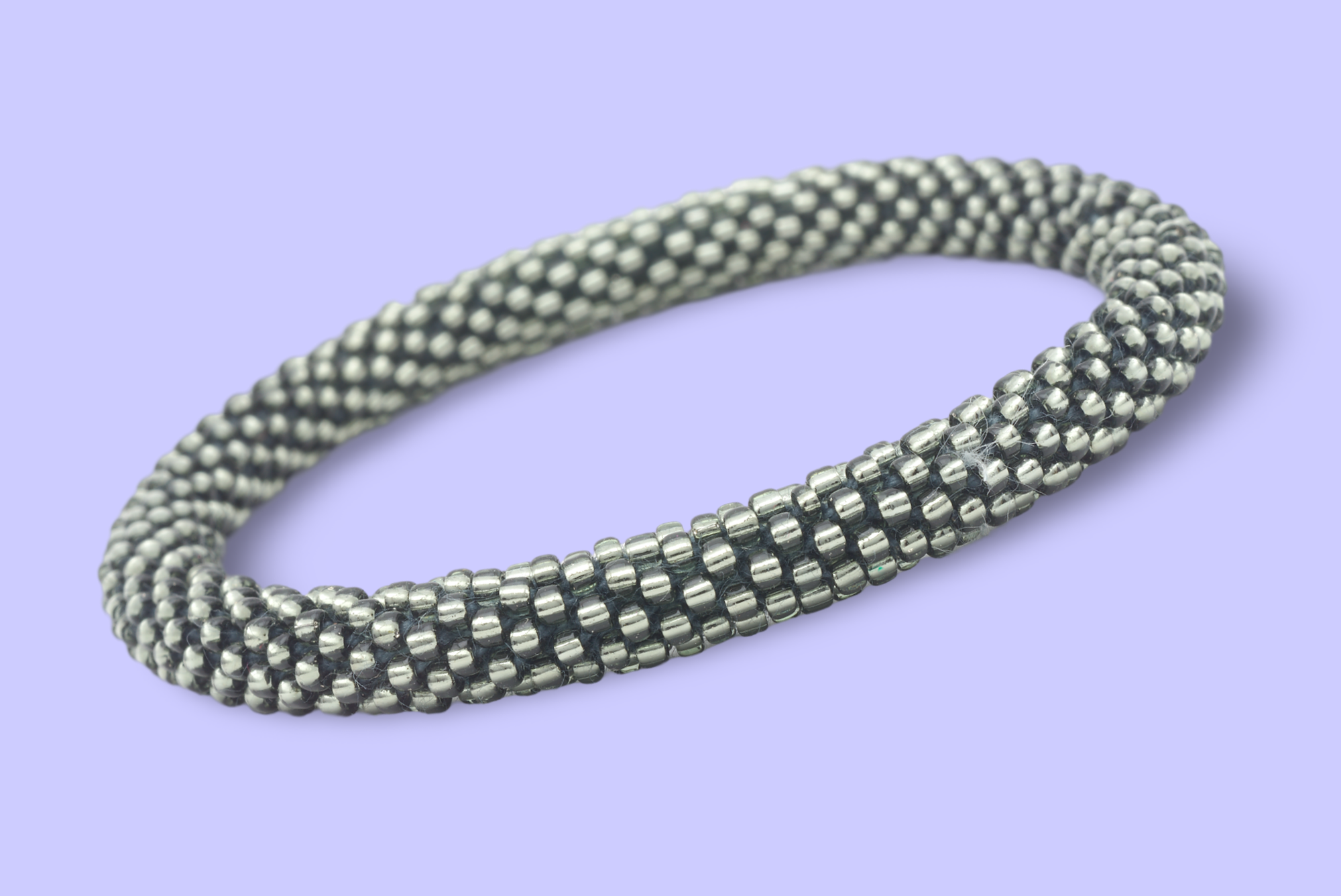 Sashka Co handmade beaded friendship bracelet with solid silver glass beads. Crafted in Nepal by skilled artisans.