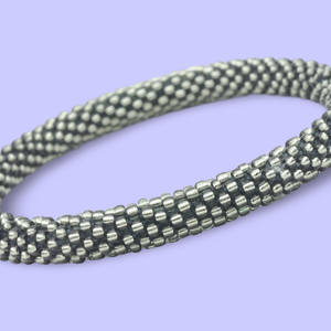 Sashka Co handmade beaded friendship bracelet with solid silver glass beads. Crafted in Nepal by skilled artisans.