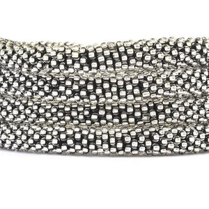 Sashka Co handmade beaded friendship bracelet with silver glass beads. Crafted in Nepal by skilled artisans in a solid pattern.