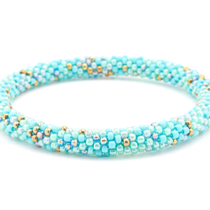 Sashka Co handmade beaded friendship bracelet with turquoise, mint, gray, bronze, and iridescent glass beads. Crafted in Nepal by skilled artisans in a confetti pattern.