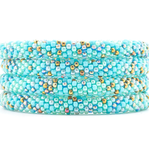 Sashka Co handmade beaded friendship bracelet with turquoise, mint, gray, bronze, and iridescent glass beads. Crafted in Nepal by skilled artisans in a confetti pattern.