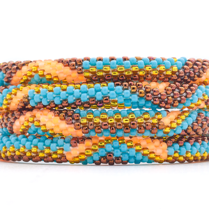 Sashka Co handmade beaded friendship bracelet with turquoise, orange, brown, and gold glass beads. Crafted in Nepal by skilled artisans.