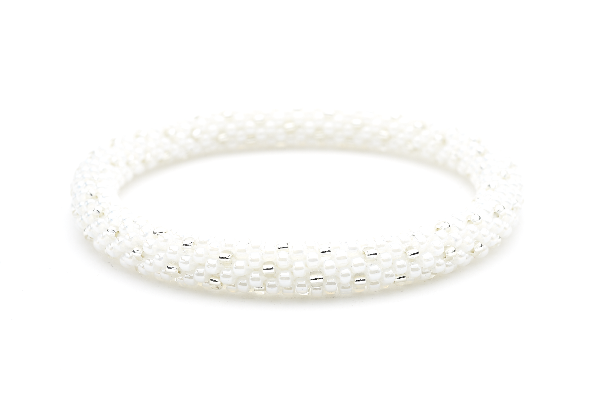 Sashka Co handmade beaded friendship bracelet with white and clear glass beads. Crafted in Nepal by skilled artisans in a polka dot pattern.