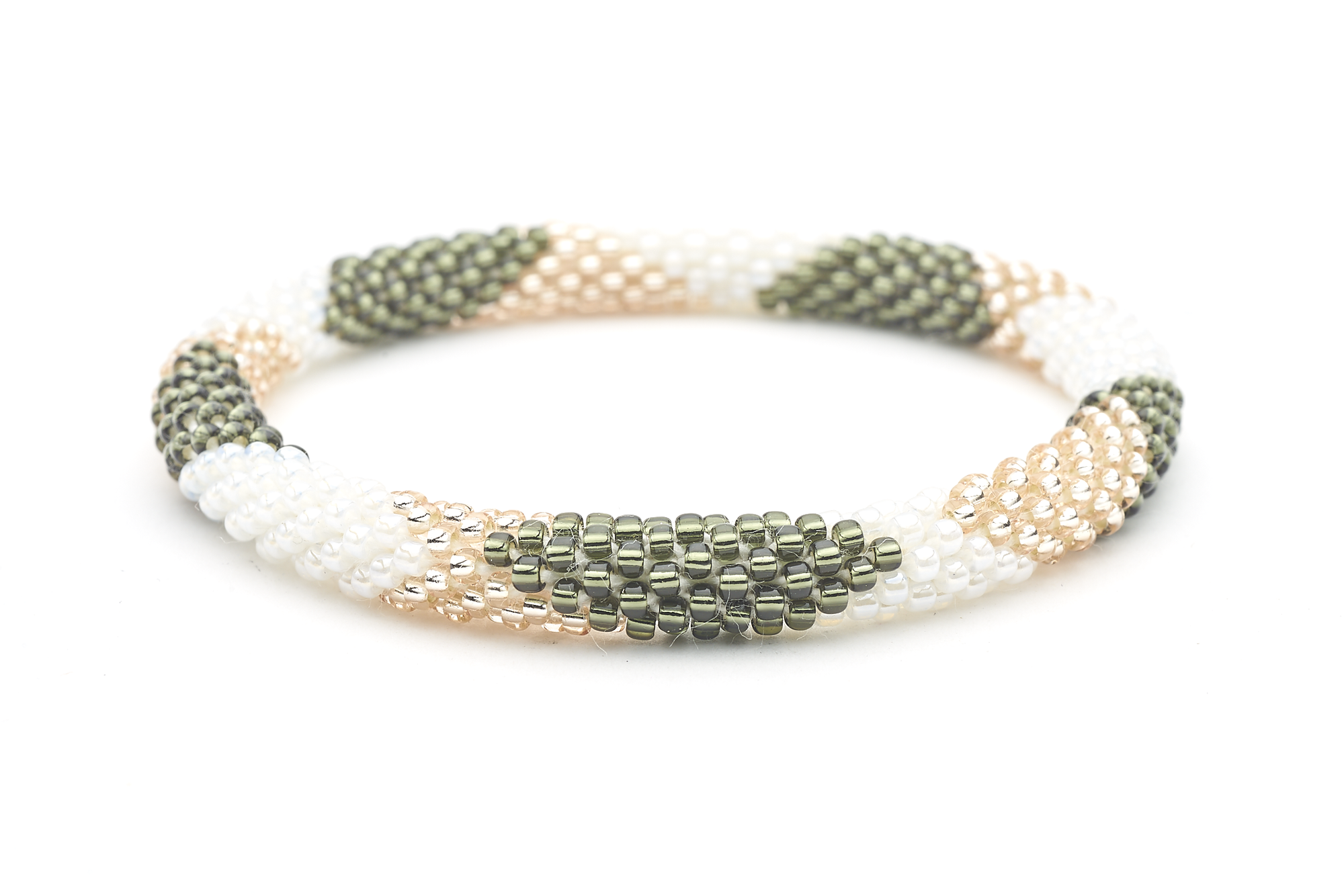 Sashka Co handmade beaded friendship bracelet with white, rose gold, and silver glass beads. Crafted in Nepal by skilled artisans in a large diamond pattern.