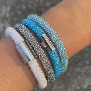 Stack of Sashka Co. Bracelets showing the quality of the glass beads. 