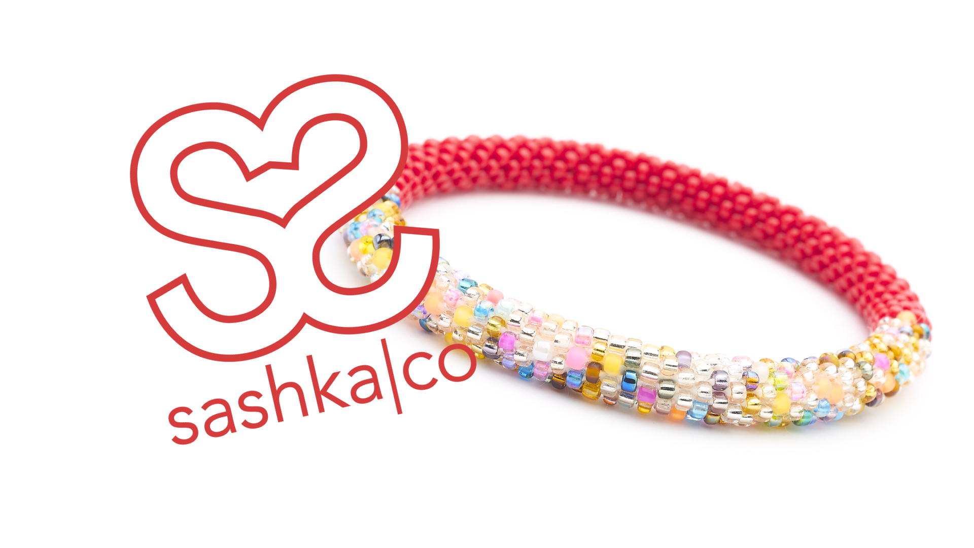 Sashka Co. handmade glass beaded friendship bracelet with red and a colorful mix of glass beads. Crafted in Nepal by skilled artisans.