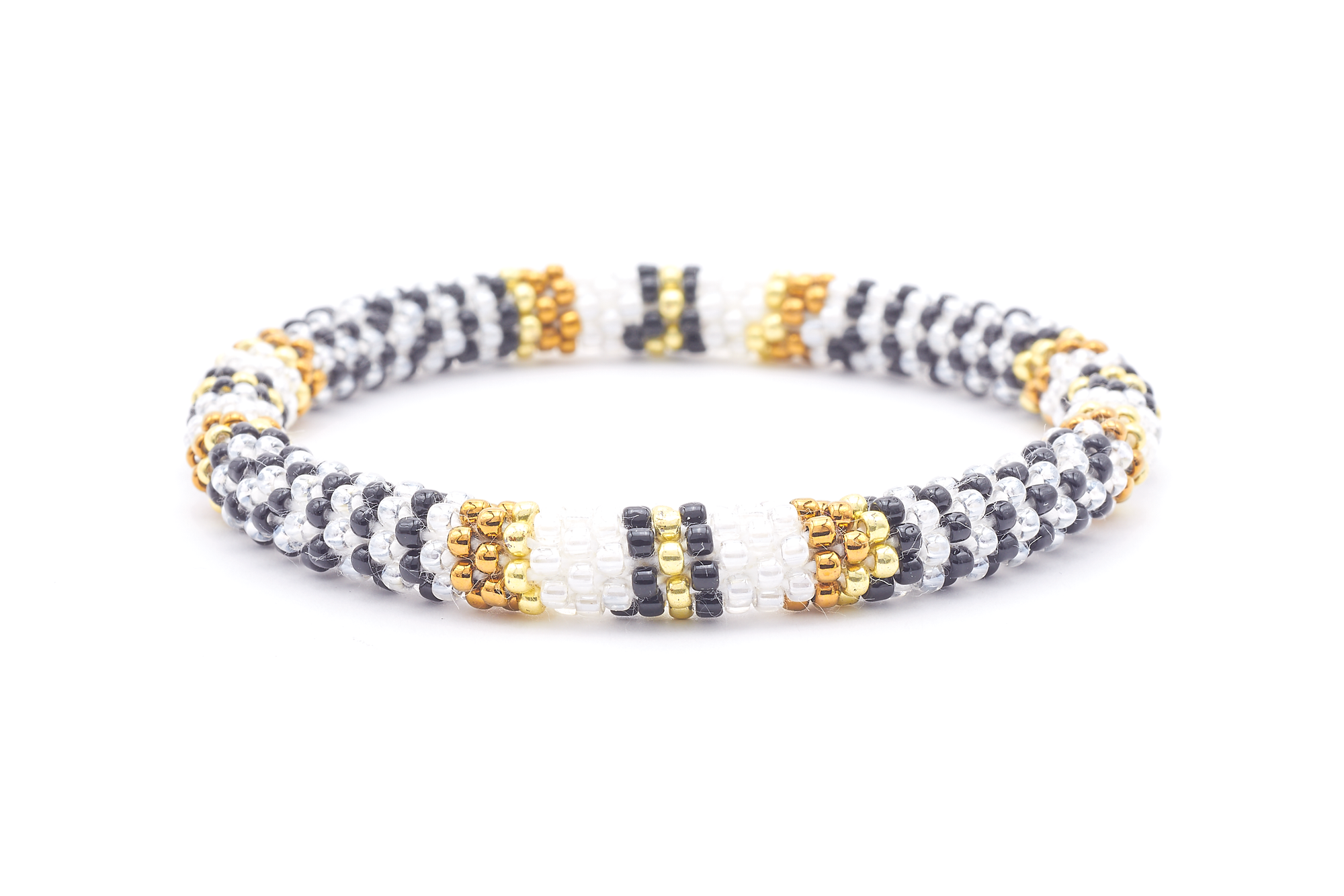 Sashka Co. handmade glass beaded friendship bracelet with white, black, brown, and gold glass beads. Crafted in Nepal by skilled artisans.