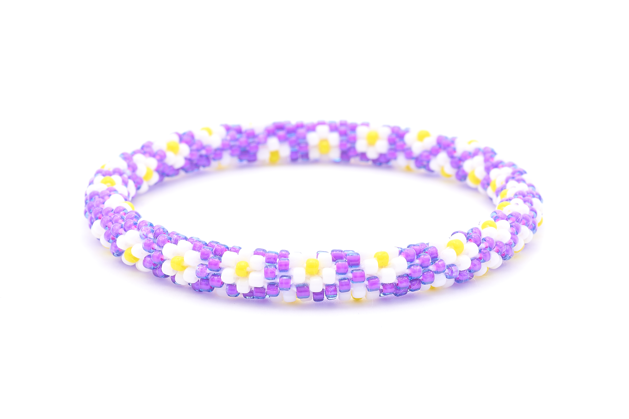 Sashka Co. handmade beaded friendship bracelet with purple, white, and yellow flower pattern. Crafted in Nepal by skilled artisans.