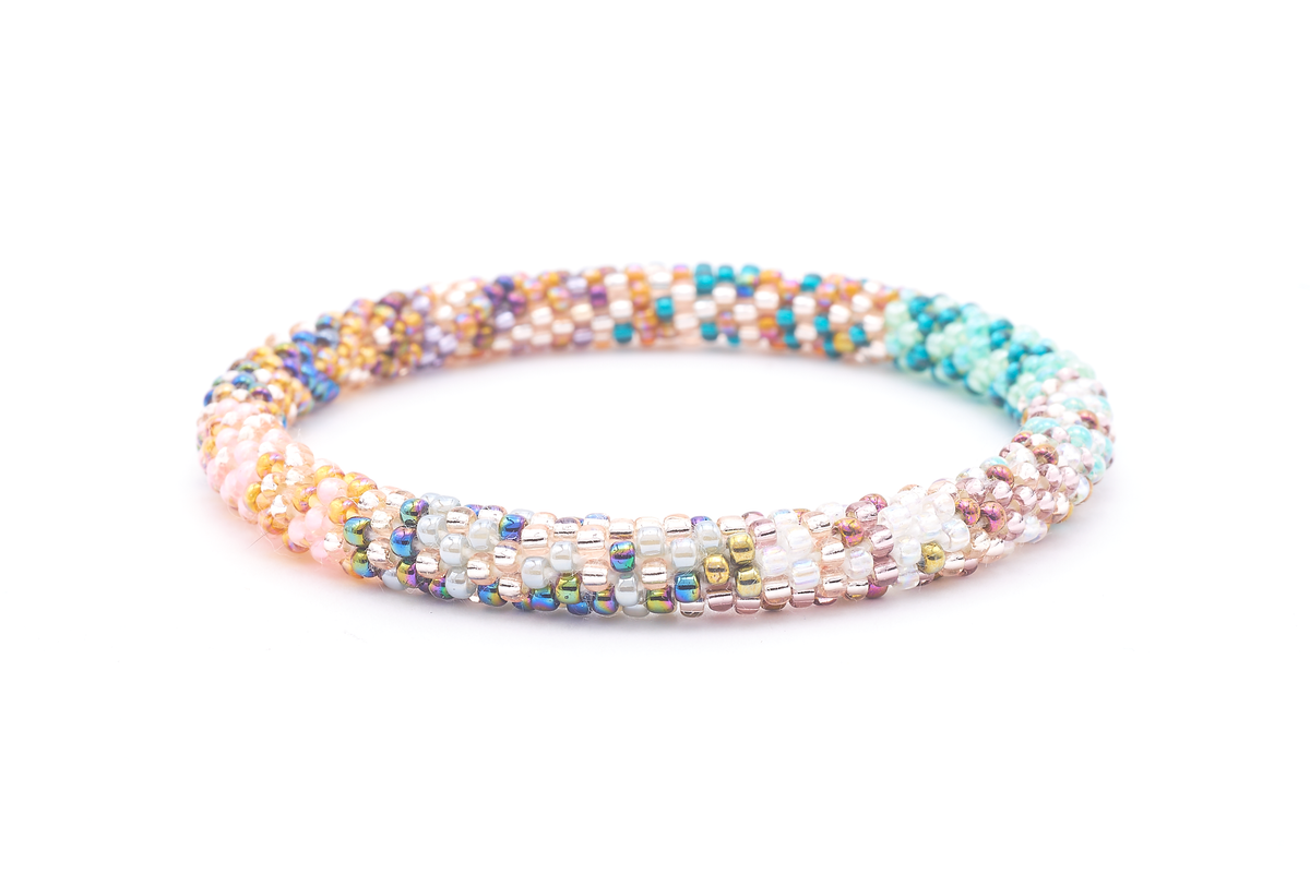 Sashka Co. handmade glass beaded friendship bracelet with iridescent, rose gold, mint, teal, pink, clear, and silver glass beads in a confetti mixed pattern. Crafted in Nepal by skilled artisans.