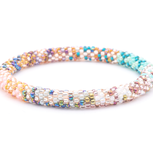 Sashka Co. handmade glass beaded friendship bracelet with iridescent, rose gold, mint, teal, pink, clear, and silver glass beads in a confetti mixed pattern. Crafted in Nepal by skilled artisans.