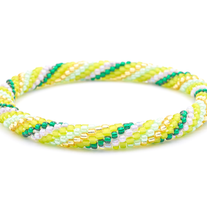 Sashka Co. handmade beaded friendship bracelet with green, mint, matte green, champagne gold, and light purple spiral pattern. Crafted in Nepal by skilled artisans.