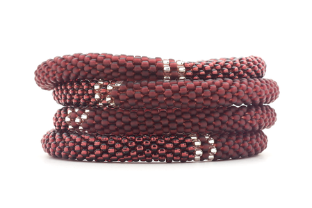 Handmade glass bead deep purple and clear bracelet from Nepal, featuring a roll design. Also known as a beaded bracelet, seed bead bracelet, beach glass bracelet, or sea glass bracelet