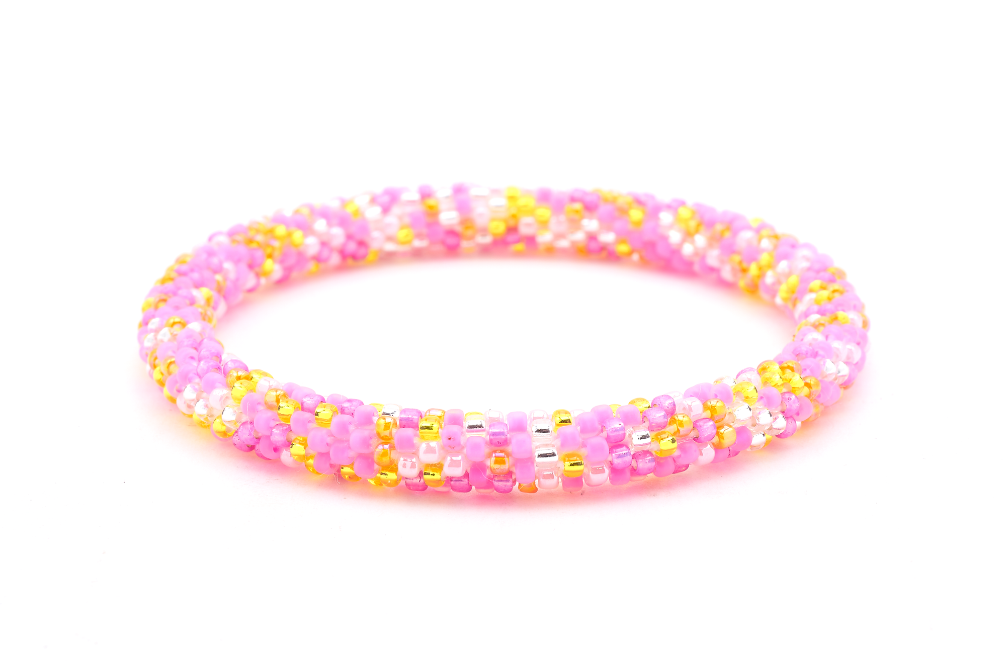 Handmade beaded friendship bracelet with matte pink, pink, yellow, orange, and clear glass beads. Crafted by artisans in Nepal for Sashka Co.