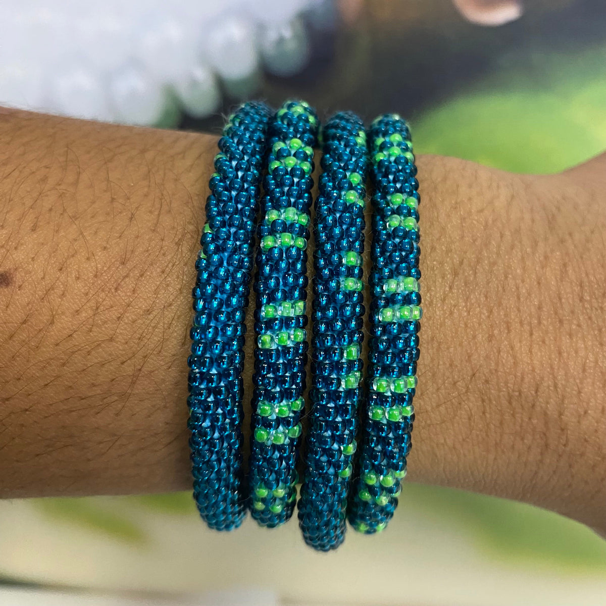 Handmade glass bead bracelet from Nepal, featuring a roll design. Also known as a beaded bracelet, seed bead bracelet, beach glass bracelet, or sea glass bracelet