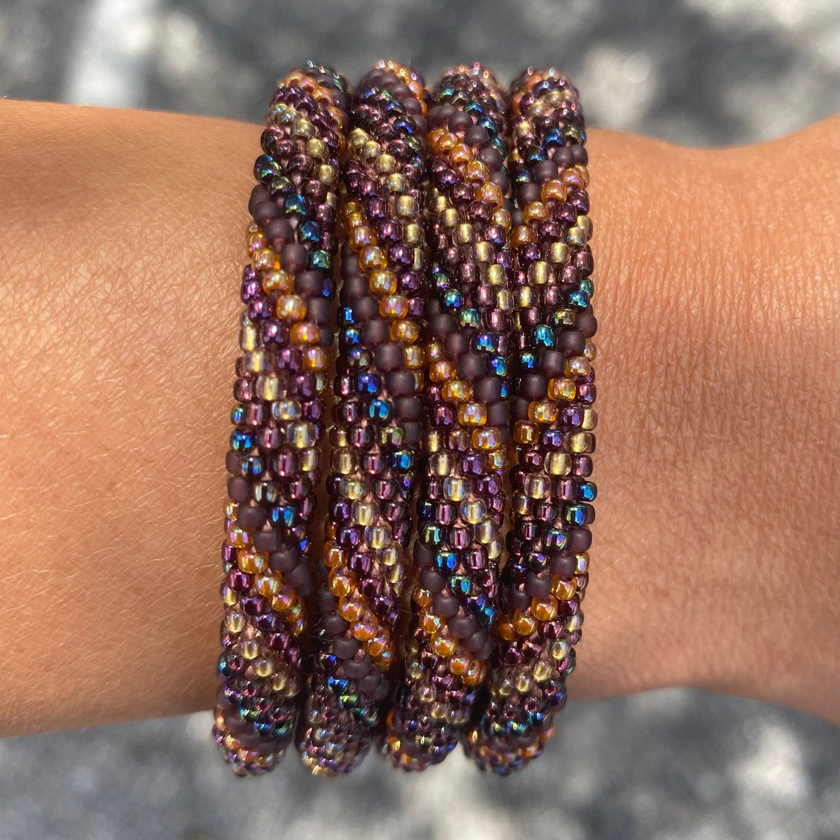 Handmade glass bead bracelet from Nepal, featuring a roll design. Also known as a beaded bracelet, seed bead bracelet, beach glass bracelet, or sea glass bracelet