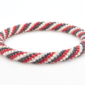 Handmade glass bead bracelet from Nepal, featuring a roll design. Also known as a beaded bracelet, seed bead bracelet, beach glass bracelet, or sea glass bracelet