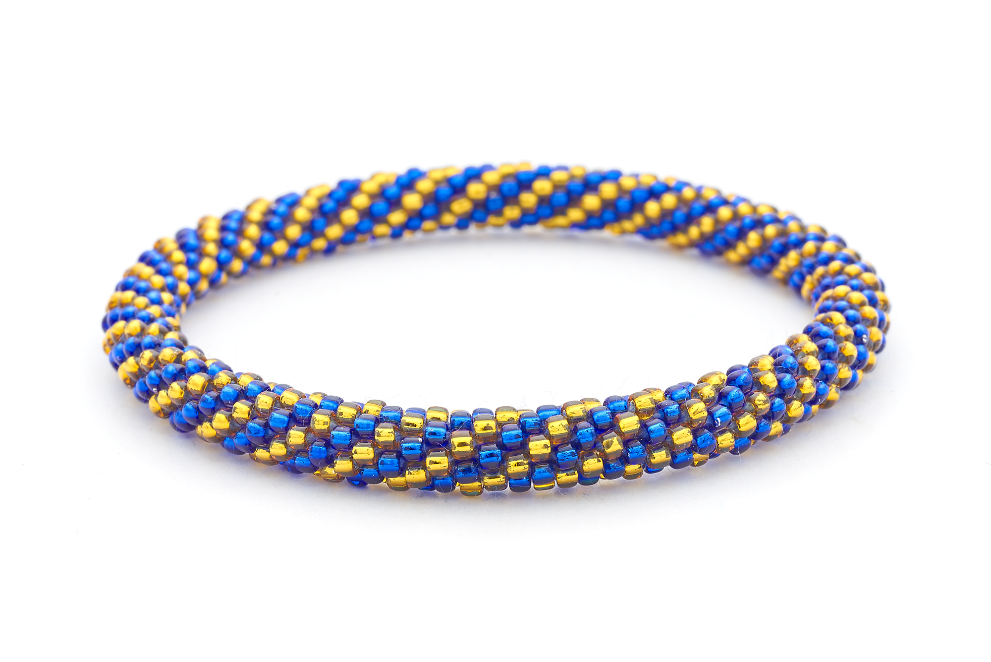 Handmade glass bead bracelet from Nepal, featuring a roll design. Also known as a beaded bracelet, seed bead bracelet, beach glass bracelet, or sea glass bracelet