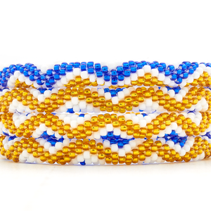 Handmade glass bead bracelet from Nepal, featuring a roll design. Also known as a beaded bracelet, seed bead bracelet, beach glass bracelet, or sea glass bracelet