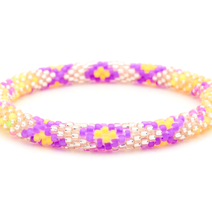 Handmade glass bead bracelet from Nepal, featuring a roll design. Also known as a beaded bracelet, seed bead bracelet, beach glass bracelet, or sea glass bracelet