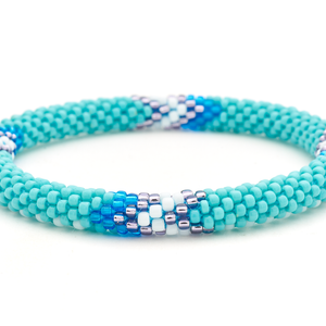 Handmade glass bead bracelet from Nepal, featuring a roll design. Also known as a beaded bracelet, seed bead bracelet, beach glass bracelet, or sea glass bracelet