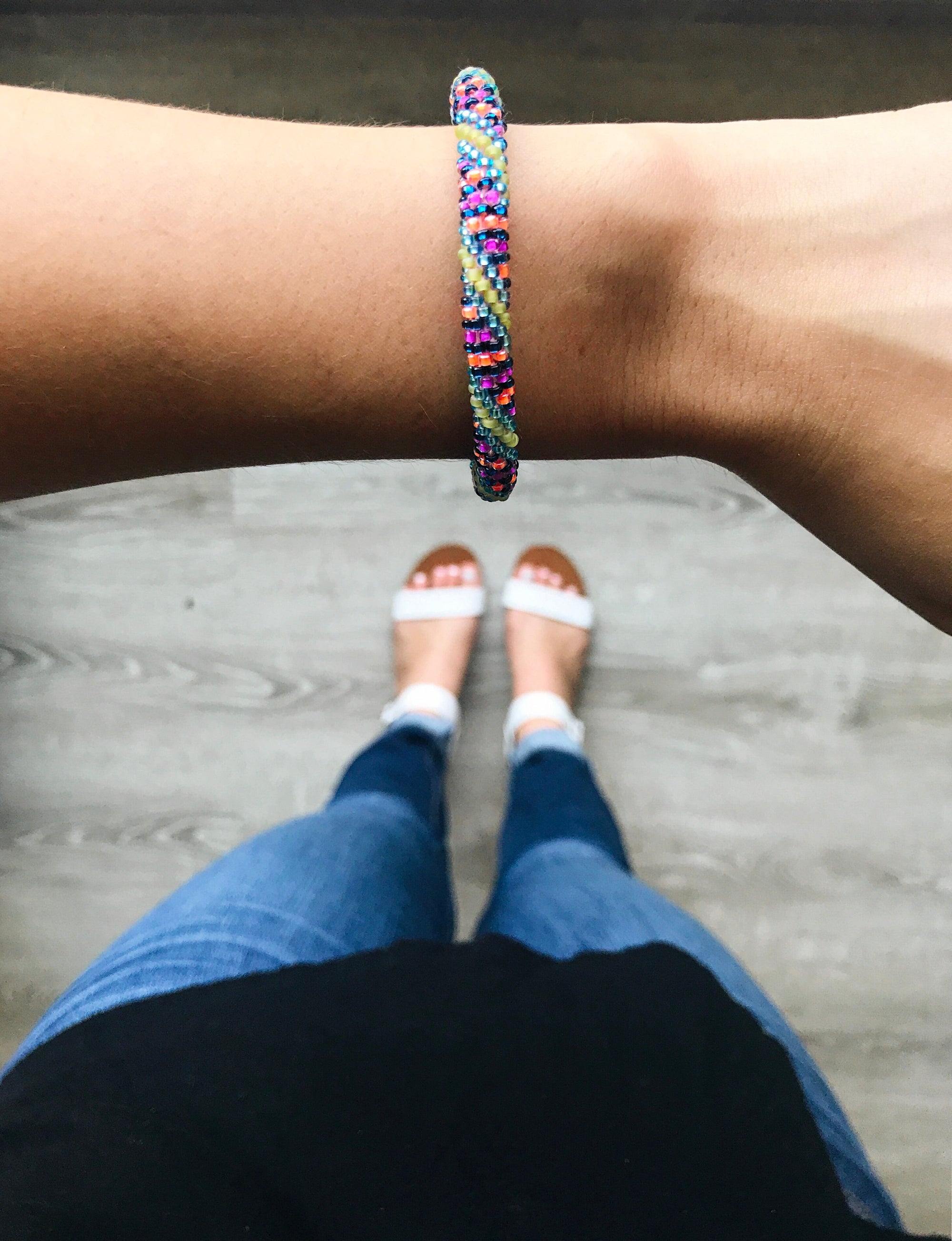 Handmade glass bead bracelet from Nepal, featuring a roll design. Also known as a beaded bracelet, seed bead bracelet, beach glass bracelet, or sea glass bracelet