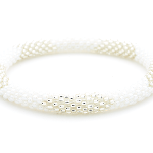 Handmade glass bead bracelet from Nepal, featuring a roll design. Also known as a beaded bracelet, seed bead bracelet, beach glass bracelet, or sea glass bracelet