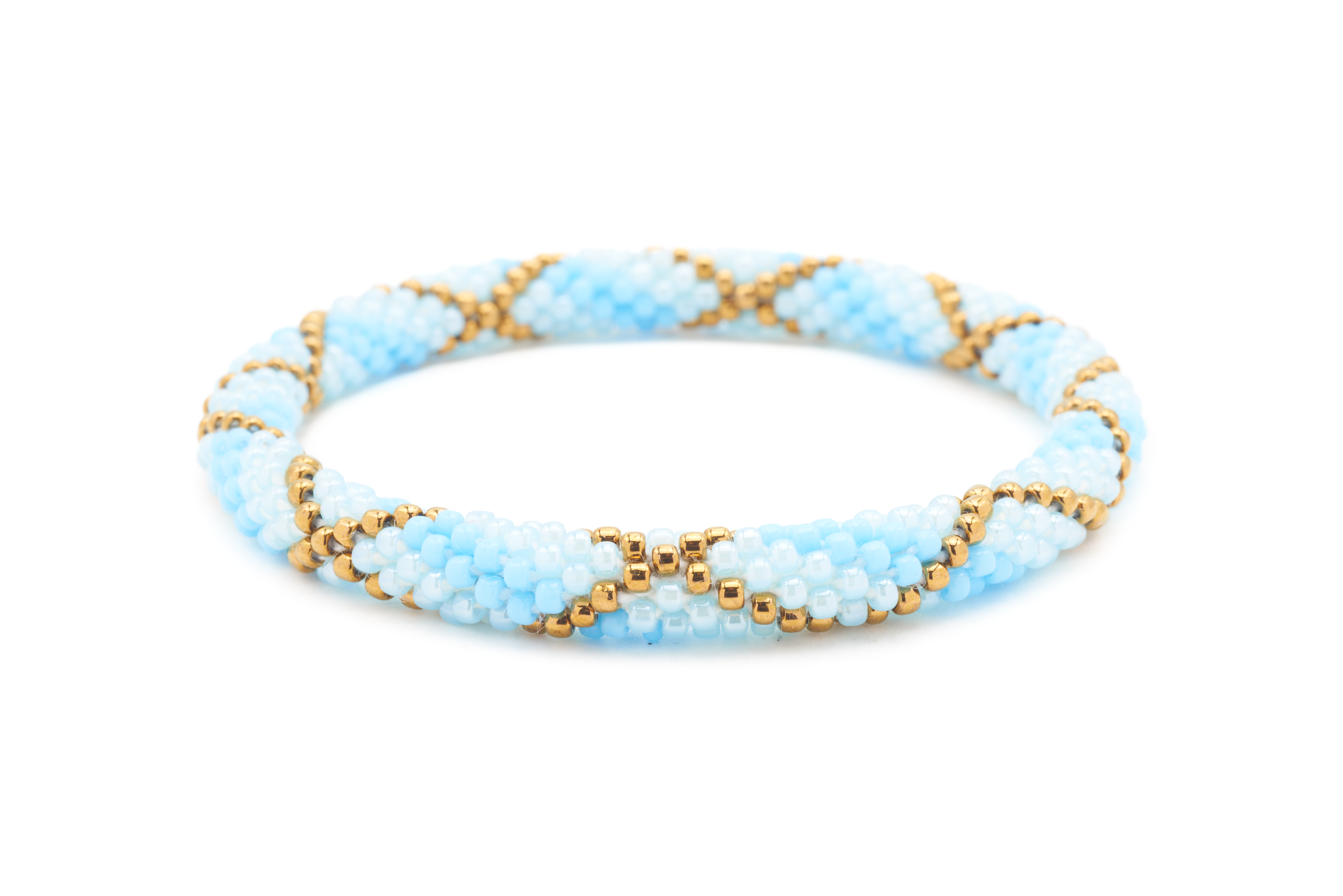 Sashka Co. Blue, Light Blue, Bronze Bracelet. Handmade glass bead bracelet from Nepal, featuring a roll design.