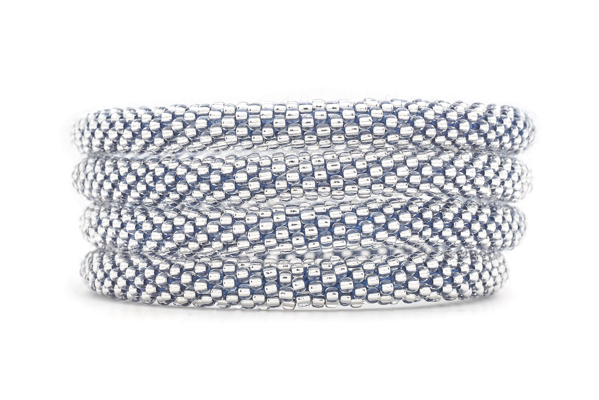 Handmade glass bead Clear Bead w/ Dark Blue Thread bracelet from Nepal, featuring a roll design. Also known as a beaded bracelet, seed bead bracelet, beach glass bracelet, or sea glass bracelet
