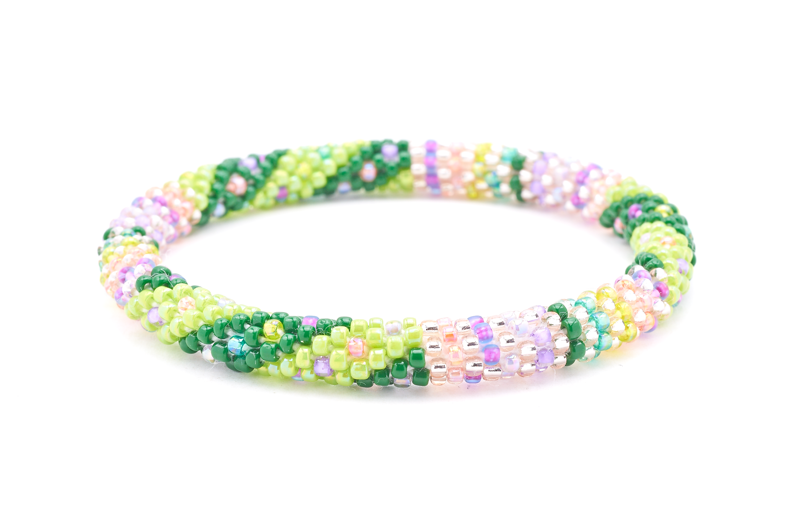 Sashka Co. Green, Light Green, Rose Gold, Purple, Peach Bracelet. Handmade glass bead bracelet from Nepal, featuring a roll design.