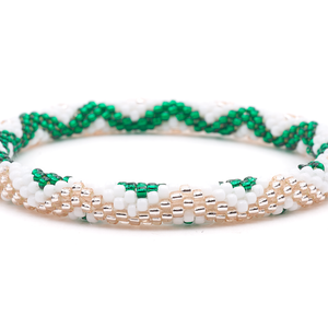 Sashka Co. Green, Rose Gold, White Bracelet. Handmade glass bead bracelet from Nepal, featuring a roll design.
 
