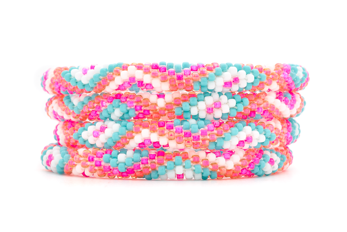 Handmade glass bead Hot Pink, Turquoise, White, Pink bracelet from Nepal, featuring a roll design. Also known as a beaded bracelet, seed bead bracelet, beach glass bracelet, or sea glass bracelet