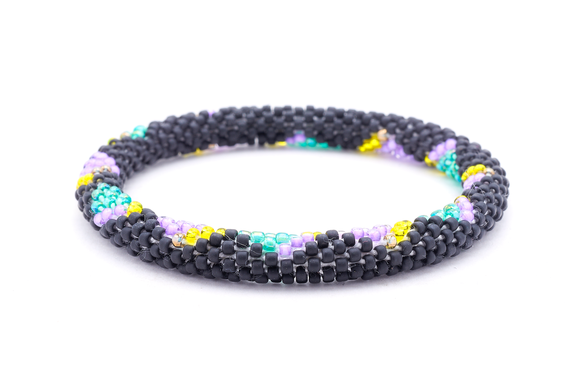 Sashka Co. Matte Black, Purple, Teal, Yellow Bracelet. Handmade glass bead bracelet from Nepal, featuring a roll design.