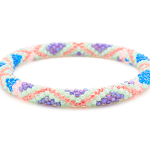 Sashka Co. Mint , Blue , Purple , Red , Coral Bracelet. Handmade glass bead bracelet from Nepal, featuring a roll design.