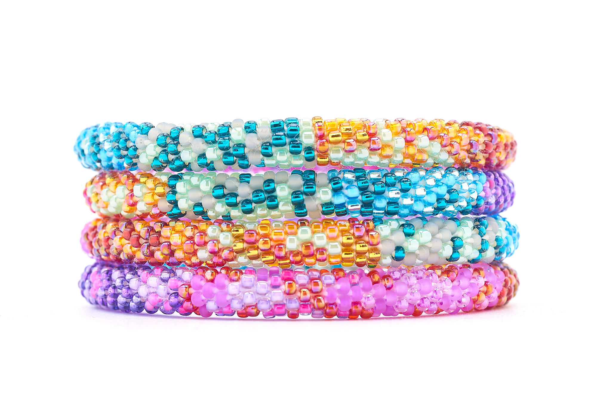 Sashka Co. Mixed Purples, Blues, Gray, Orange, Reds, Pinks Bracelet. Handmade glass bead bracelet from Nepal, featuring a roll design.