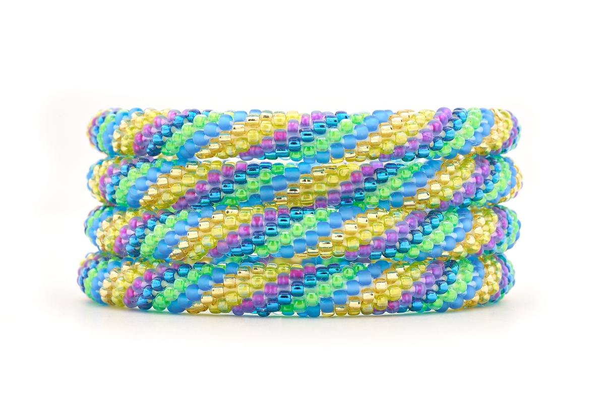 Handmade glass bead Teal , Purple , Gold , Green bracelet from Nepal, featuring a roll design. Also known as a beaded bracelet, seed bead bracelet, beach glass bracelet, or sea glass bracelet