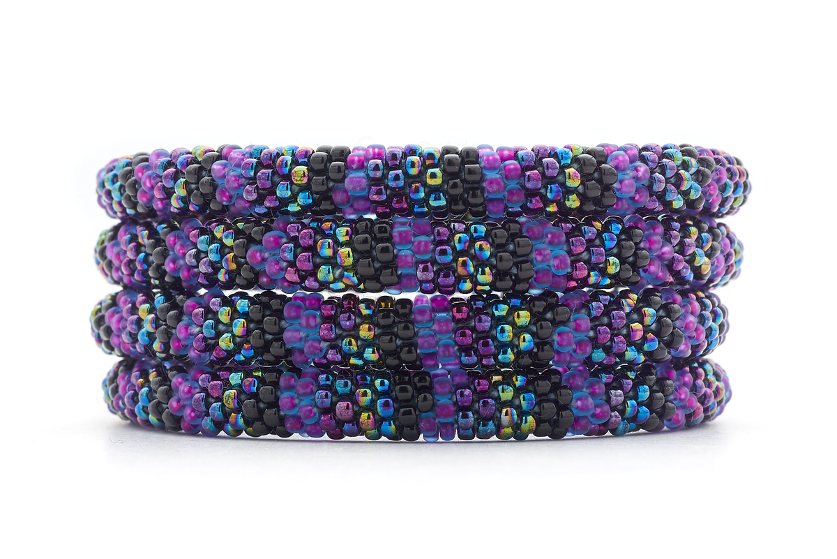 Handmade glass bead purple, black, iridescent bracelet from Nepal, featuring a roll design. Also known as a beaded bracelet, seed bead bracelet, beach glass bracelet, or sea glass bracelet
