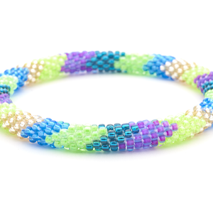 Sashka Co. handmade glass beaded friendship bracelet with Teal,  Purple, Champagne Gold, Green,Blue glass beads. Crafted in Nepal by skilled artisans.